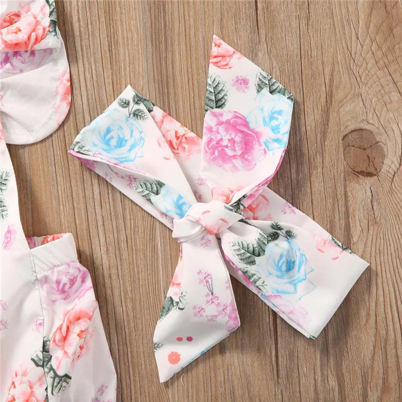 Ensemble 2 pièces bébé fille – Combinaison florale sans manches + bandeau